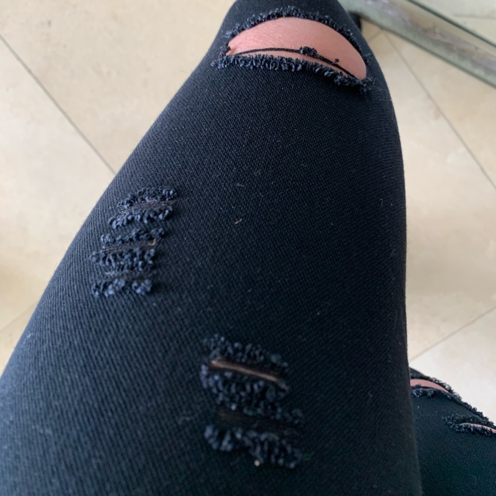 Ripped black skinny jeans